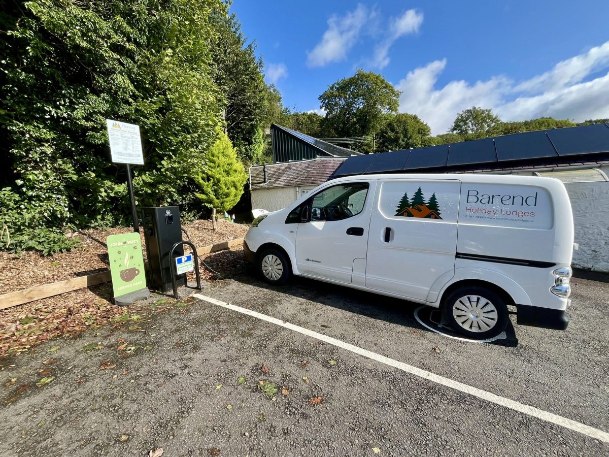 electric vehicle being charged by EV charger onsite
